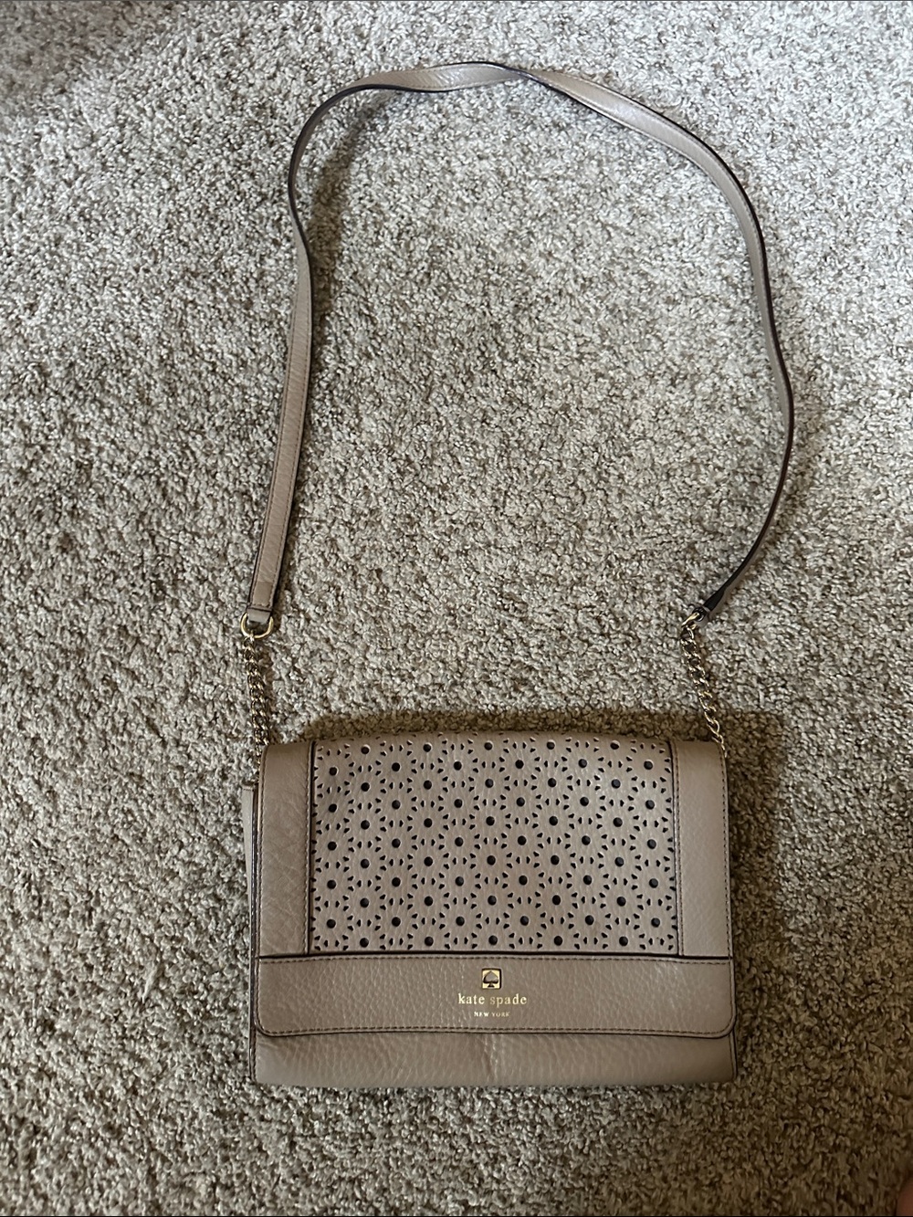 kate spade taupe perforated leather crossbody with gold-tone logo